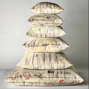 Throw pillows with vintage library card Artwork